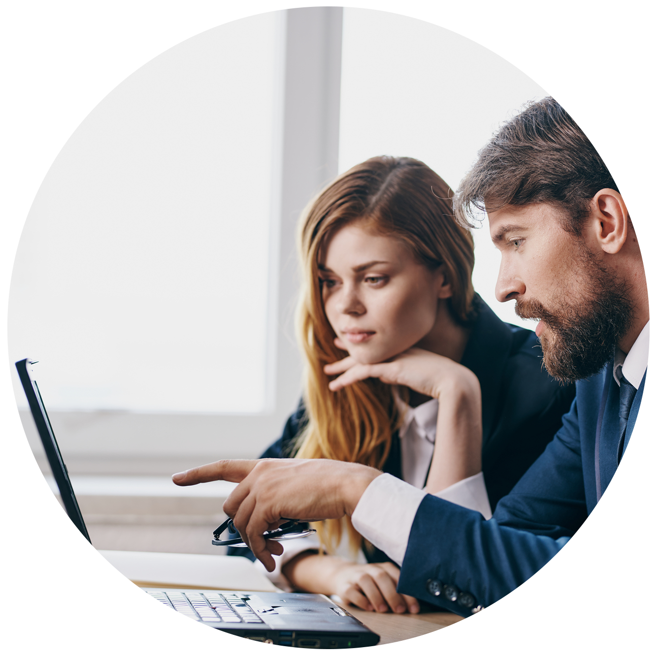 Business Man And Woman Watching A Laptop